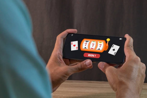BNI mobile banking app showing transfer confirmation screen with roobet details